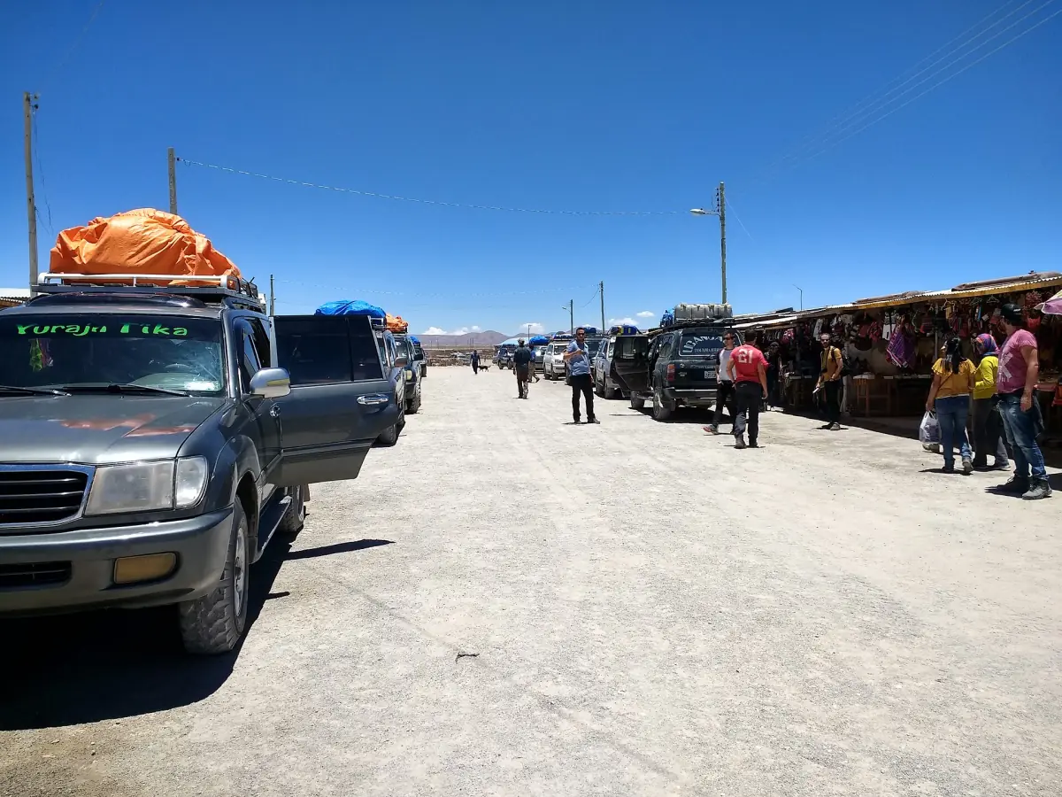 Tourists and tour vehicles in Colchani