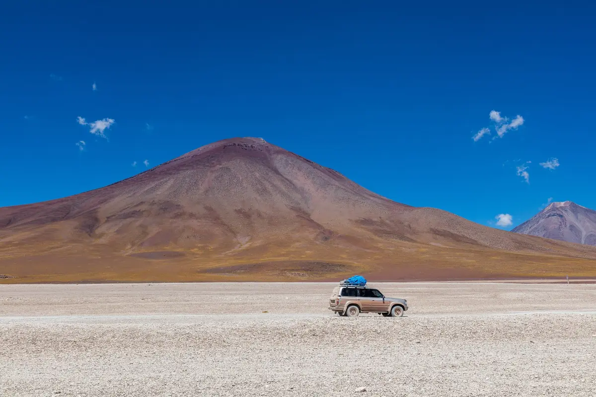 Licancabur volcano with a tour jeep