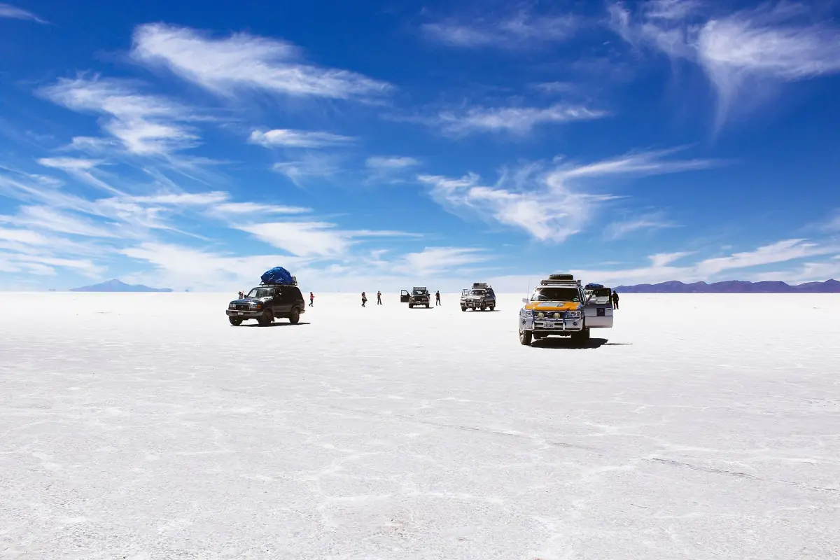 Tour jeeps crossing the salt flat