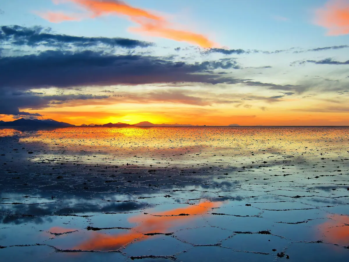 Sunset clouds reflected on the Uyuni Salt Flat